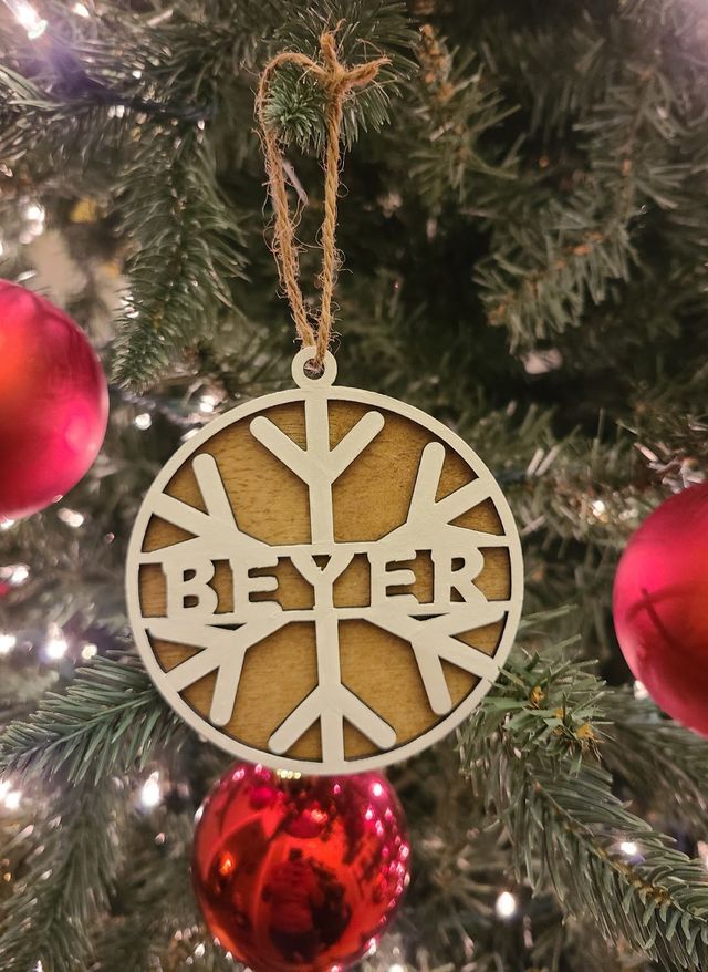 Snowflake ornament with a family name