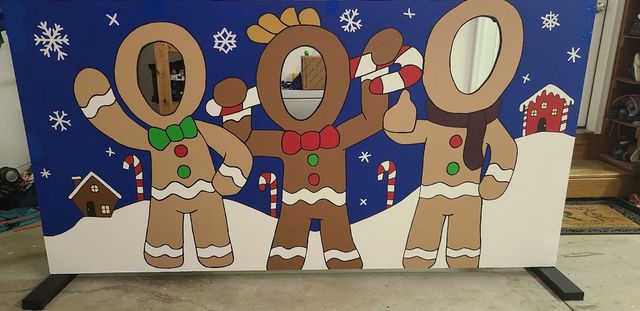 Gingerbread photo board with face cutouts