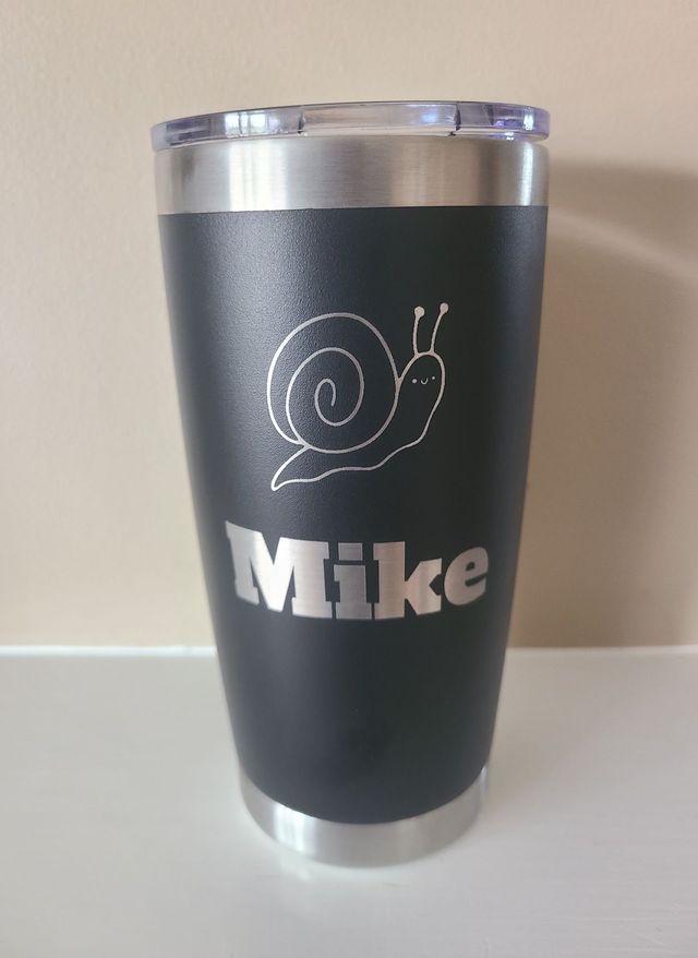 Tumbler engraved with a name and a snail